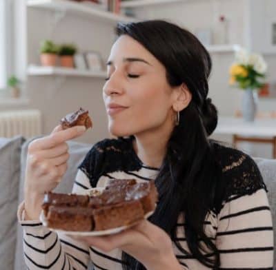 woman eating cake