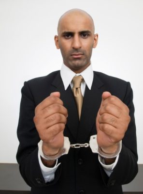 businessman handcuffs