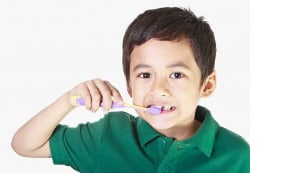 boy brushing teeth