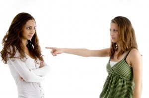 girl pointing at other girl