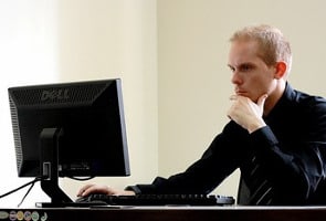 man working hard on computer