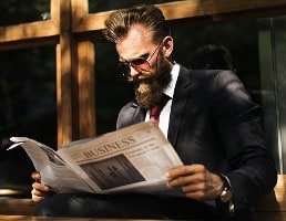 man reading newspaper